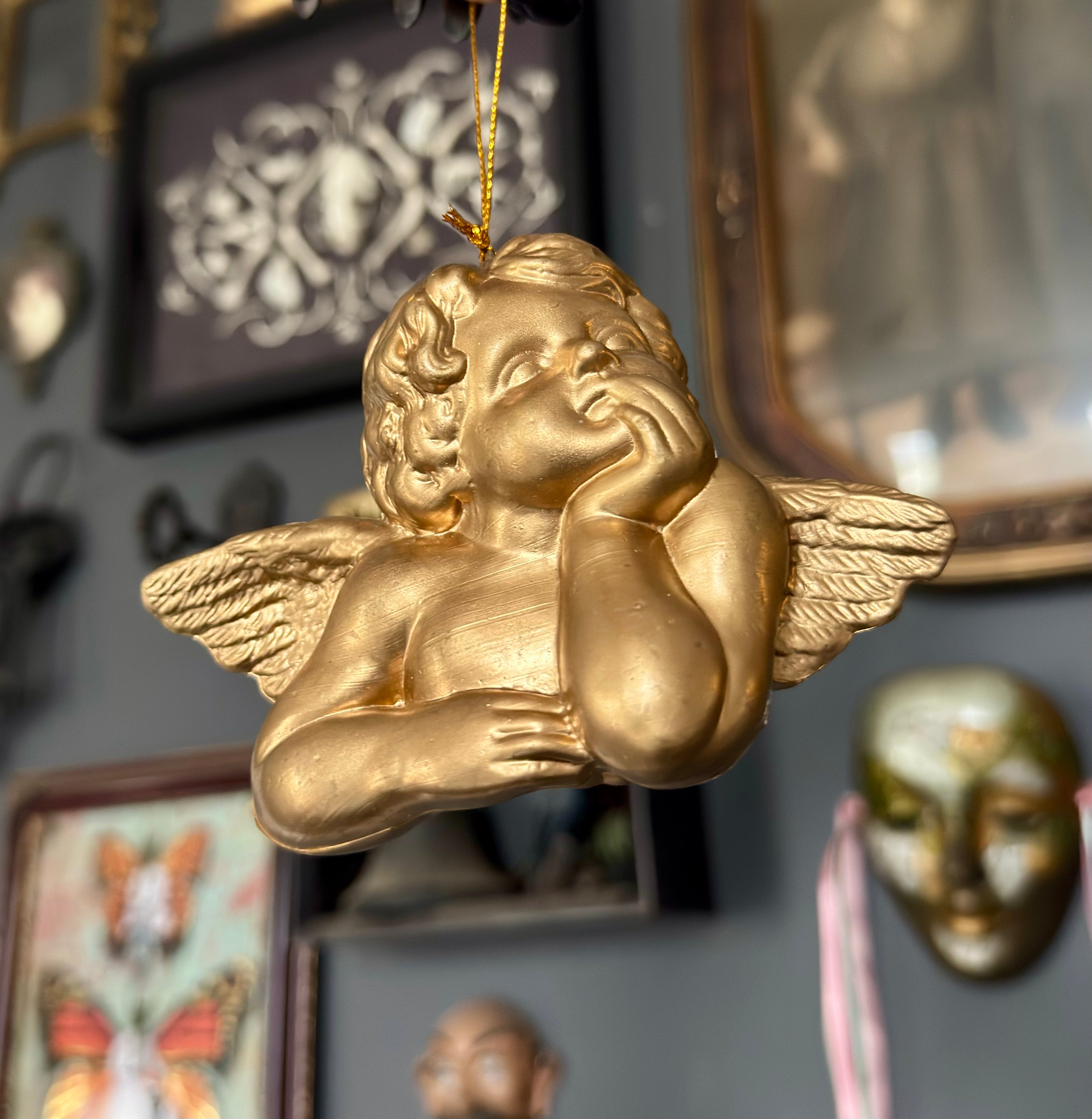 Vintage Style Cherub Leaning On Palm Ornament